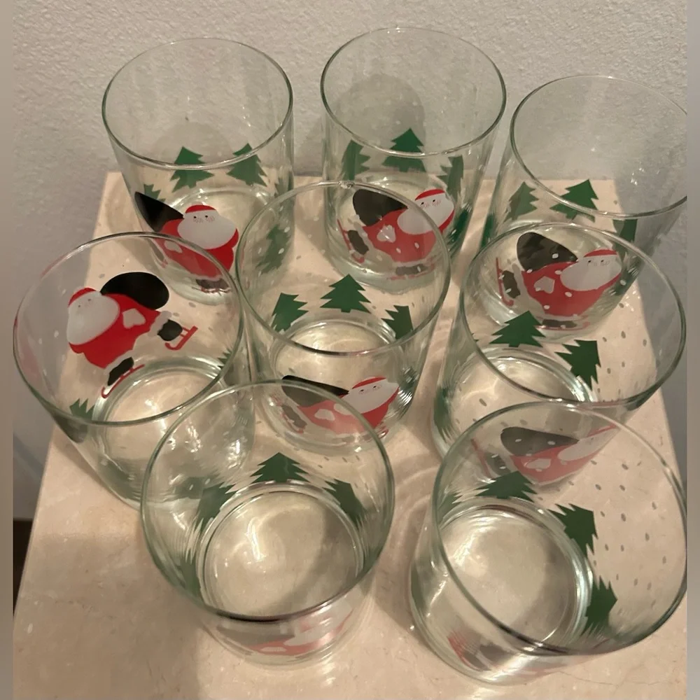 8 Crate & Barrel vintage skating Santa lowball glasses. 12oz